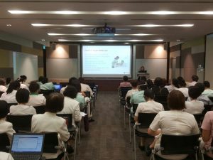 Information session about HelperGo services at a healthcare venue