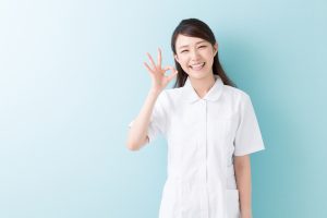 Caregiver with elderly client at home